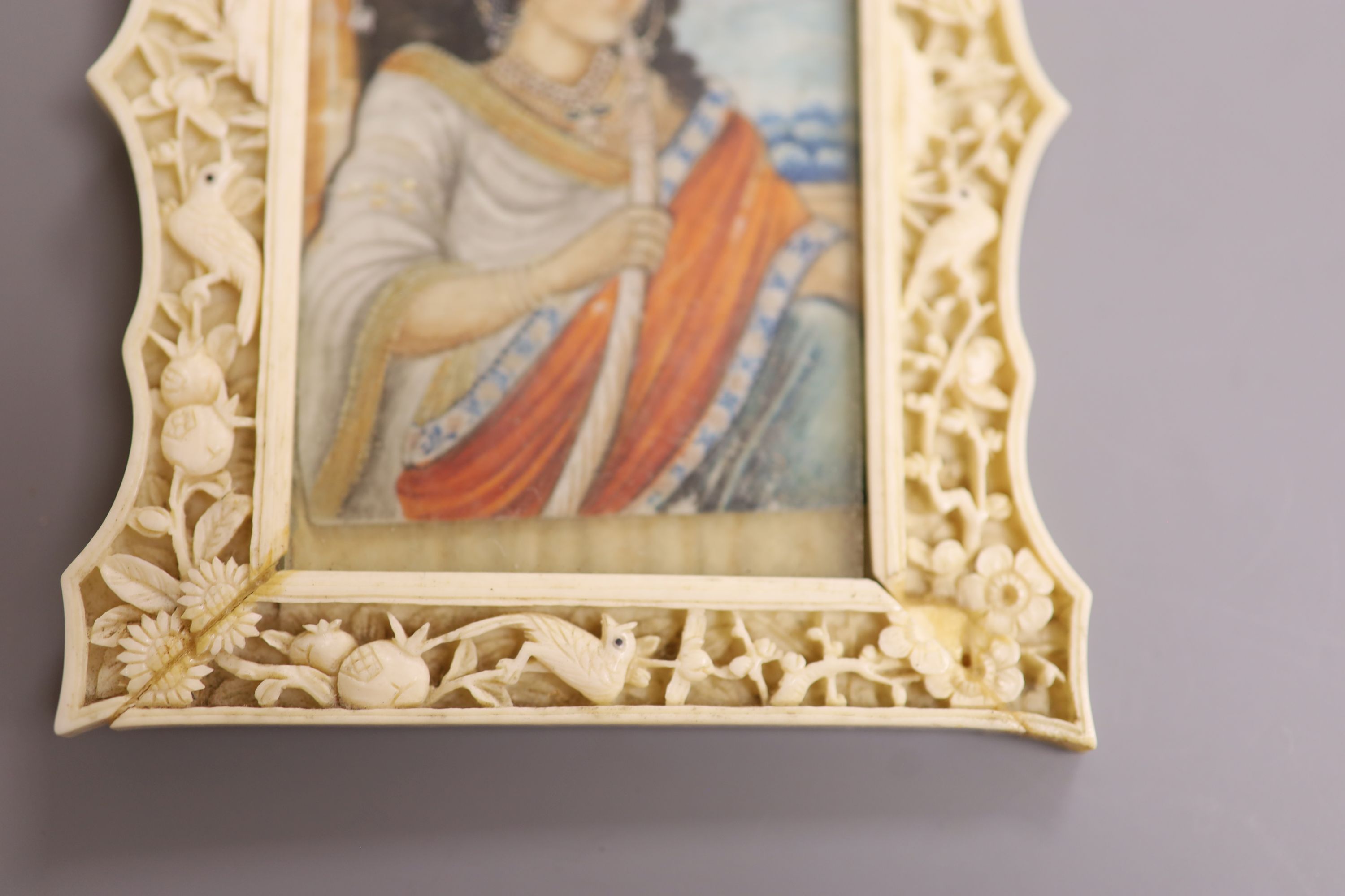 An Indian miniature gouache on ivory in a Chinese Ivory frame, circa 1900 8 x 5.5cm